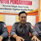 Ketua Bawaslu Madiun saat mengklarifikasi kasus penyebaran uang saat kampanye (Dok.ist)